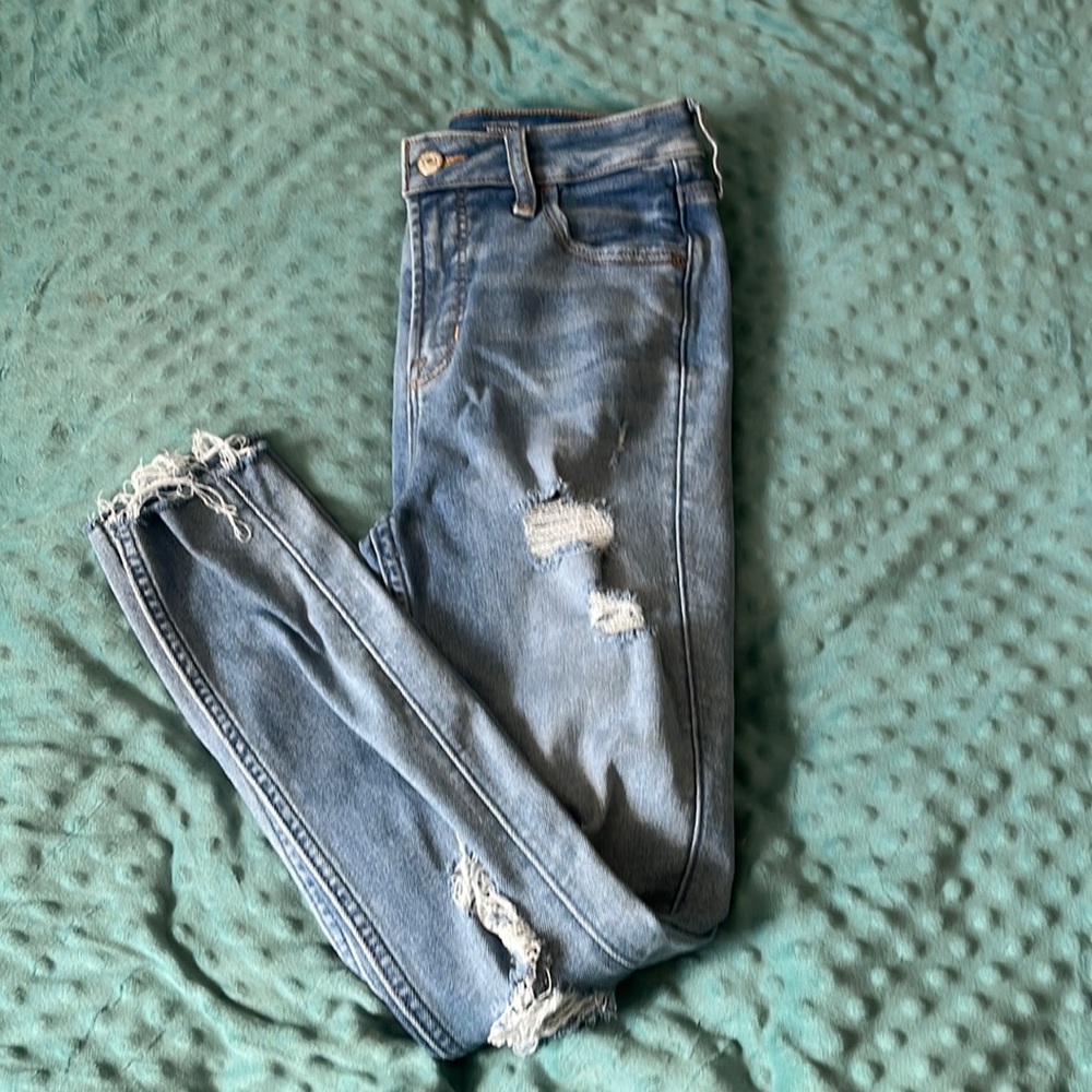 Ripped mom jeans. Never worn.